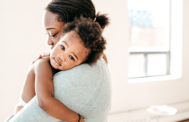 child hugging mom