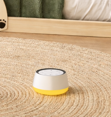 white noise machine on the rug