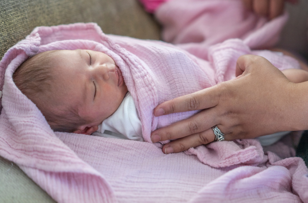 baby wrapped up in muslin

