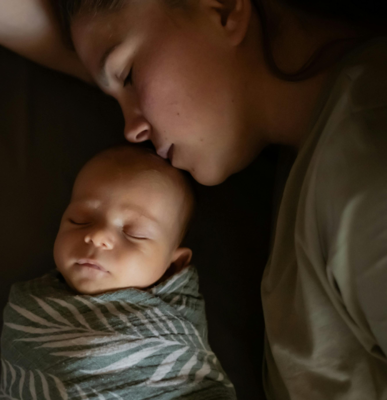 Co-Sleeping With a Baby: Bedsharing Safety Guide for New Parents