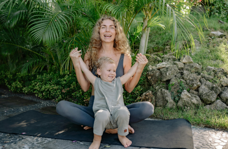 mother and boy sitting outside
