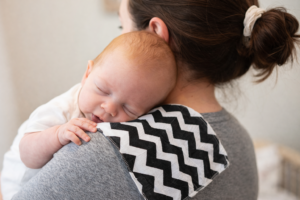 baby burping with muslin cloth