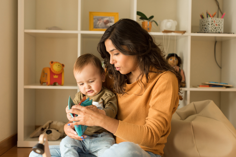 mum and baby reading a book