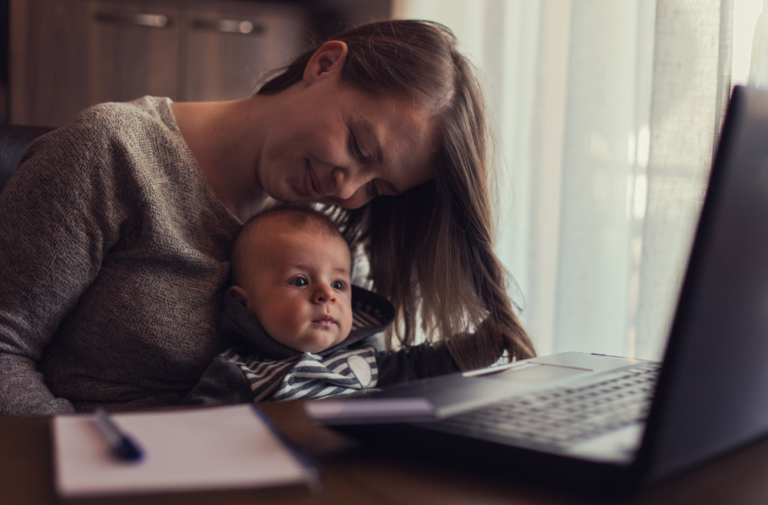 mum and baby working on laptop