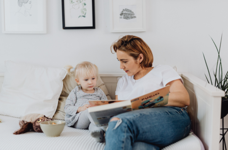 mum and toddler reading a book