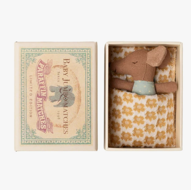 Blue baby mouse in a matchbox toy.