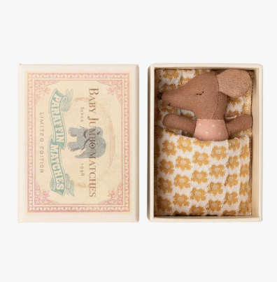Pink baby mouse in a matchbox toy.